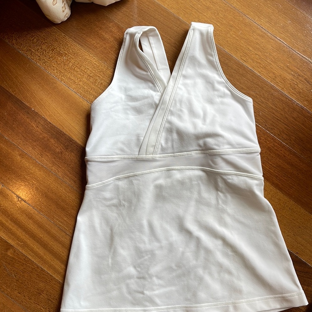 Lulu lemon lightly worn white tank top built in bra. Size 6